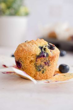 a muffin with blueberries and other toppings