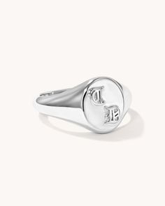 Sometimes it takes two: Introducing our 2 Initials signet ring in beautiful Blackletter lettering, perfect as a gift for yourself or your loved ones. Available in 925 sterling silver, 18k yellow gold plated, 14k solid yellow gold, and 14k solid white gold.2 Initials Length: 12.7mm Width: 10.16mm Thickness: 3mmItem Capitalization: UPPER CASE Timeless Silver Initial Ring, Everyday Engraved Signet Ring Fine Jewelry, Engraved Signet Ring For Everyday Wear, Everyday Engraved Fine Jewelry Signet Ring, Classic White Gold Initial Ring For Everyday, Silver Timeless Initial Ring For Anniversary, Timeless Silver Initial Ring For Anniversary, Silver 14k Gold Initial Ring For Everyday, Classic Everyday Personalized Signet Ring