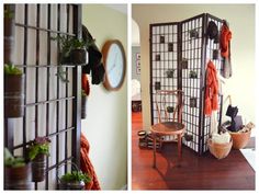 a room divider made out of wire and wood with plants growing on the wall