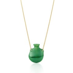 One of Elsa Peretti's first jewelry designs. Pendant in hand-carved green jade. Size small, on a 28" 18k gold chain. 29 x 23 mm. Bottle is open and can hold a flower. Original designs copyrighted by the Nando and Elsa Peretti Foundation | Elsa Peretti® Bottle Green Jade Pendant On a Gold Chain, Small Elsa Peretti Jewelry, Perfume Necklace, Perfume Bottle Design, Bottle Pendant, Gold Chain Design, 18k Gold Chain, Gold Chains For Men, Bottle Necklace, Elsa Peretti