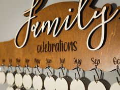 a wooden sign that says family celebrations hanging on the wall