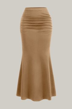 Indulge in the exquisite elegance of our High Waist Pleated Fish Tail Skirt. With a stunning ruched detail and a sophisticated mermaid silhouette, this skirt effortlessly accentuates your natural waistline and falls gracefully at midi length. The medium stretch knitted fabric adds comfort and versatility to this luxurious piece. Perfect for any occasion, this skirt is a must-have for those with a taste for the finer things in life. No sheerness, just sheer perfection. 95% Polyester, 5% Elastane Fitted Skirt With Folds For Evening, Ruched Long Evening Skirt, Evening Ruched Long Skirt, Evening Long Skirt With Ruched Details, Evening Long Ruched Skirt, Fitted Long Draped Skirt With Folds, Ruched Draped Long Skirt For Formal Occasions, Formal Fitted Draped Skirt With Folds, Formal Ruched Long Draped Skirt