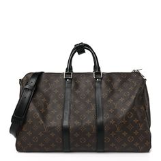 This is an authentic LOUIS VUITTON Monogram Macassar Keepall Bandouliere 45. This stylish duffel is crafted of classic Louis Vuitton monogram coated toile canvas in brown with black leather accents. The bag features black leather top handles, trim, an optional adjustable shoulder strap with polished silver hardware. The top zipper opens to a burgundy fabric interior. Louis Vuitton Monogram Bag, Louis Vuitton Travel, Burgundy Fabric, Black Leather Top, Louis Vuitton Keepall, Monogram Bag, Louis Vuitton Damier Ebene, Leather Accents, Louis Vuitton Shoulder Bag