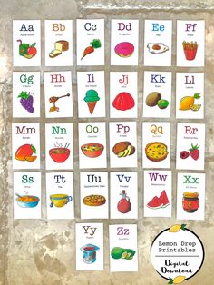 an alphabet flash card with pictures of fruits and vegetables