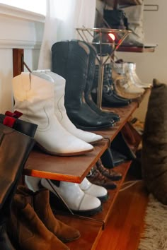 Walk In Closet Modular Shelving Unit With Various Pairs of Boots along it Walk In Closet Room, Shelving Diy, Diy Neon Sign, Rumpus Room