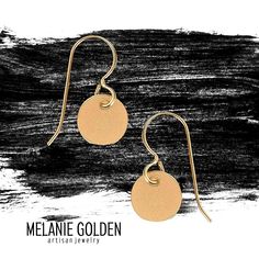 These sleek and modern Tiny Disc Dangle Earrings are the perfect accessory for any outfit. Made with 14k goldfill, they are both beautiful and durable. The smooth discs catch the light beautifully, making them the perfect earrings for a night out or a special occasion. Whether you're dressing up or dressing down, these earrings will add a touch of elegance to your look. Minimalist 14k Gold Filled Circle Earrings, Simple 14k Gold Nickel-free Earrings, Simple 14k Gold-filled Nickel-free Earrings, Gold Circle Earrings 14k Gold Filled, Adjustable Modern Earrings In 14k Gold Filled, Simple Gold Earrings For Everyday, Modern Adjustable 14k Gold Filled Earrings, Nickel Free Minimalist 14k Gold Filled Earrings, Gold 14k Round Disc Earrings