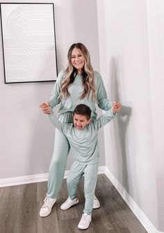 Introducing our new sage green family loungewear set! We absolutely love it because it's made from 95% Premium viscose from bamboo, making it the softest fabric ever. Not only is it incredibly gentle on sensitive skin, but it's also highly breathable and temperature-regulating, making it perfect for snuggling up with your loved ones. Details: 95% Premium viscose from Bamboo Softest fabric ever Gentle on sensitive skin Highly Breathable Elastic Waistband Side pockets Perfect for snuggling Made su Matching Family Pjs, Matching Loungewear Set, Family Pjs, Green Bamboo, Mommy And Me Outfits, Loungewear Set, Matches Fashion, Family Matching, Comforters Cozy