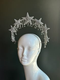 Dazzle and Sparkle bright in this Star studded jewel halo festival crown. We can customize design to match your outfit, get in touch for a design consultation and custom quote.  S H I P P I N G -  Processed same day or within 24 hours.  1-2 day guaranteed delivery, add item to cart, click shipping tab for rates.  Pls leave a check out note with your need date & contact number  Msg for delivery time frames (Include your state/country) S I Z E  Adult size. For children, pls contact to resizing or leave a check out note.   C U S T O M I Z A T I O N Flower arrangements can be customized. Get in touch for a custom listing, we love to work on custom orders!  C O N T A C T  Text: 1-516-654-4643 Email: Lanai.ink6 [!at] gmail.com Web: www.higginscreek.com  P H O T O  Images displayed on this listin Star Head Piece, Star Goddess Costume, Star Princess Aesthetic, Whimsical Teardrop Crown For Parties, Silver Crown Headpiece For Parties, Mystical Adjustable Headpieces For Party, Adjustable Silver Crown For Party, Adjustable Silver Crown For Parties, Bohemian Tall Crown For Party