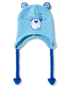 Stay warm, cozy, and cute with this Grumpy Care Bear laplander hat! This fun and attention-getting hat is perfect for any Care Bears fan! Officially licensed Adjustable Relaxed fit Material: Polyester Care: Spot clean Imported Care Bear Accessories, Playful Cotton Winter Hat, Playful Warm Cotton Hat, Warm Cotton Playful Hat, Warm Playful Cotton Hat, Playful Warm Hat For Playtime, Fun Winter Hats For Playtime, Playful Hats For Cold Weather, Playful Beanie Hat For Playtime