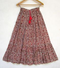 ITEM DESCRIPTION bohemian red floral printed summer skirts | boho vintage screen printed skirts Fabric: 100% cotton voile soft crinkled fabric Length: - 36 inch long Waist   :-28.00 inch full (14 inch half) 28 inch relaxed can stretch up to 50 inch Size: free size (fit to all)                                           PRODUCT NAME: - Long Women Maxi skirts  Ladies Vintage Long skirts Company Return Policy:  Please write for more information to my email directly CHOOSE "ASK SELLER QUESTION " paym Red Floral Print Maxi Skirt For The Beach, Red Floral Print Maxi Skirt For Beach, Bohemian Red Floral Print Skirt, Red Bohemian Skirt With Floral Print, Boho Print Long Cotton Skirt, Traditional Boho Print Skirt For Summer, Red Floral Print Tiered Maxi Skirt, Red Tiered Maxi Skirt With Floral Print, Long Cotton Skirt With Boho Print