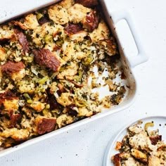 a casserole dish filled with stuffing next to a bowl of broccoli