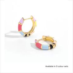 these beautiful huggie earrings will bring a tough of glamour to your outfit. available in 3 variations  Pesca Blanco Bella Hoop Huggie Earrings In Enamel, Trendy Enamel Hoop Jewelry, Trendy Gold Enamel Hoop Earrings, Pink Enamel Hoop Earrings, Enamel Huggie Hoop Earrings For Pierced Ears, Trendy Round Enamel Hoop Earrings, Enamel Huggie Hoop Earrings, Enamel Huggie Earrings Perfect For Gifts, Trendy Enamel Huggie Earrings