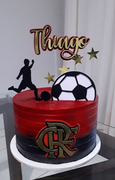 there is a cake with a soccer theme on it