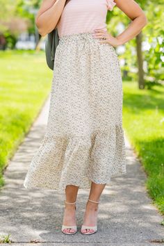 Flowy Ruffled Midi Maxi Skirt, Chic Midi-length Bottoms With Ruffles, Spring Floral Print Flowy Skirt, Floral Print Flowy Flared Skirt, Flowy Floral Print Flared Skirt, Flowy Feminine Bottoms With Ruffle Hem, Floral Print Flowy Skirt, Feminine Flowy Bottoms With Ruffle Hem, Flowy Maxi Skirt For Spring Day Out