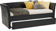 a black daybed with yellow and gray pillows on it's sides, sitting against a white background