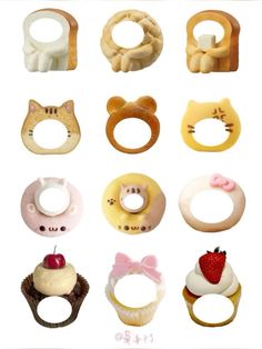 an assortment of different types of doughnuts with bows and cats on them, all decorated in pastel colors