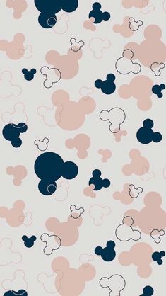 mickey mouse wallpaper with pink, blue and black shapes on it's surface