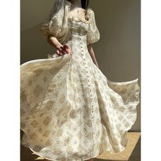 A long dress with a gorgeous curvaceous, swirly pattern with plant motifs. The ruffles on the neckline and fluffy puff sleeves give it a feminine look. The decorated buttons on the front make it stand out. Create an elegant and sophisticated atmosphere. 
 
 
 Size 
 
 
 XS size 
 
 Length: 117cm 
 Shoulder width: 31cm 
 Bust: 79cm 
 Waist: 68cm 
 Sleeve length: 36.5cm 
 
 S size 
 
 Length: 118cm 
 Shoulder width: 32cm 
 Bust: 83cm 
 Waist: 72cm 
 Sleeve length: 37cm 
 
 M size 
 
 Length: 119cm Elegant Beige Victorian Dress With Ruffles, Elegant Baroque Dress With Fitted Bodice, Elegant Dresses With Fitted Bodice In Baroque Style, Elegant Fitted Baroque Dress, Elegant Baroque Dress For Wedding, Elegant Baroque Wedding Dress, Elegant Victorian Dress With Ruffles And Baroque Shape, Puff Sleeve Maxi Dress With Ruffled Fitted Bodice, Elegant Cream Floor-length Vintage Dress