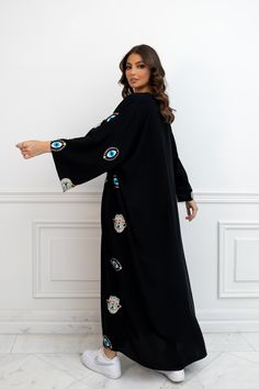 Featuring: Abaya Kimono Evil Eye & Hamsa Hand Embroidery Maxi Length Color: Black.Brand: Unmatched BYU Length: 55 inches. Black Long Kaftan With Intricate Embroidery, Traditional Black Festive Kimono, Black Embroidered Long Sleeve Kimono, Embroidered Long Kimono For Eid, Festive Black Long Sleeve Kimono, Traditional Black Dress With Kimono Sleeves, Embroidered Long Sleeve Kimono For Eid, Traditional Maxi-length Kimono For Eid, Evil Eye Dress