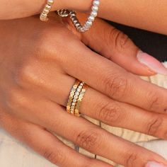 elevate your ring stack with our Sunset Lover Ring Stack. this premium set creates endless possibilities to elevate your jewelry capsule collection. wear each band individually or stack them together for a touch of luxury. the perfect addition for a sophisticated and minimal look. 18K gold pvd over 316L stainless steel water & tarnish resistant each band is 2mm thick set of 3 bands 1 cz bezel band, 2 solid bands Minimalist Gold Stackable Bands, Minimalist Stackable Gold Bands, Everyday Stackable Open Ring Bands, Stackable Everyday Open Ring Bands, Everyday Stackable Open Bands, Stackable Yellow Gold Bands For Everyday Wear, Everyday Stackable Yellow Gold Bands, Adjustable 14k Gold Stackable Eternity Band, Everyday Gold Stackable Bands