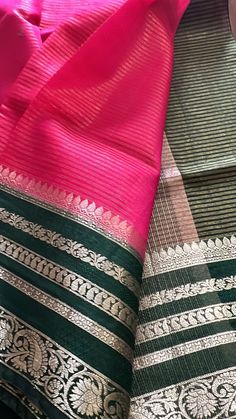 This is a beautiful Light weight warm silk saree with designer stitched blouse. This saree is hand woven. This saree would be worn for almost any occasion. Color of the saree is pink with bright green border bright red weaving with all over floral thread weaving. Blouse is perfectly stitched and designed and can fit to size 36-44inches Chest. Ships immediately. Tussar Silk Saree With Zari Weaving For Navratri, Saree Blouse Piece With Border For Diwali, Cotton Silk Saree With Cutdana Embroidery, Bollywood Style Blouse Piece With Border In Cotton Silk, Bollywood Style Cotton Silk Blouse Piece With Border, Festive Blouse Piece With Border For Puja, Navratri Chanderi Blouse Piece With Border, Festive Saree Blouse Piece With Border, Festive Puja Blouse Piece With Border