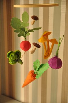 a mobile made to look like vegetables and mushrooms