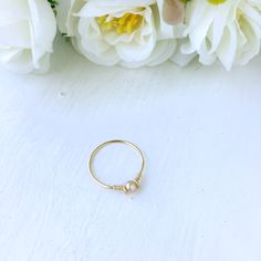 Tiny Pink Pearl Ring with genuine freshwater pearl & 14K gold filled, rose gold filled or sterling silver 💖 Dainty & sweet ring with a unique design for everyday wear, make a cute pinky ring & a lovely June birthstone gift for her Sizing: *Gemstone Diameter: 4 mm *Ring Band: 0.8 mm * Handmade in your ring size with 14K gold-filled or sterling silver wire and Natural Freshwater Pearl. * 14K gold-filled wire is known for its lasting quality. This ring will last for decades and is cons Dainty Gold Stackable Pearl Rings, Gold Pearl Stackable Rings For Anniversary, Dainty Yellow Gold Pearl Ring Gift, Delicate Hypoallergenic Toe Ring Jewelry, Rose Gold Pearl Jewelry With Wire Wrapped Detail, Dainty Gold Pearl Ring With Birthstone, Dainty Gold Ring With Pearl Drop, Hypoallergenic 14k Gold Filled Wedding Rings, Dainty Adjustable Yellow Gold Pearl Ring