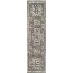 a gray and white runner rug with an intricate design