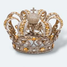 Crown of Isabela II of Spain, 925 sterling silver cz zircon yellow topaz crown, Royal tiara replica , vintage crown, antique crown Jewelry  Metal: Sterling Silver  Metal Purity: 925 Metal Wt: 1 kg 100 gram stone: Cz Zircon stone colour: white/colour less stone creation: lan created stone clarity: AAA Dimension:  Hight: 19 cm circumstances: 15 cn Gemstone: Yellow Topaz  Stone Type:Lab Created Product Color: Gold  Plated on Sterling Silver Luxury Wedding Crown Jewelry, Elegant High Crown Gold Crown, Elegant Tall Gold Crown, Luxury Crown Design Jewelry For Formal Occasions, Elegant Gold Crown With Rhinestones, Formal Tall Regal Crown, Elegant Gold Crown With Structured Shape, Elegant Rhinestone Crown Jewelry, Elegant Gold Crown With Pinched Shape