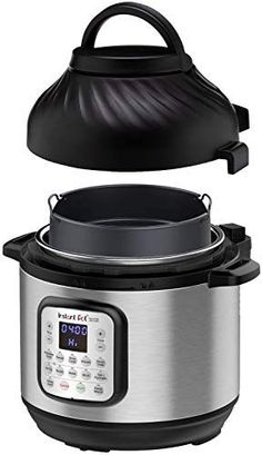 an electric pressure cooker with a lid on the top, and a digital clock