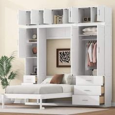 a bedroom with a bed, dresser and bookcases in white wood finish on the floor