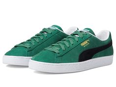 PUMA Suede Classic XXI - Men's Shoes : Vine/Puma Black/Puma White : Keep it cool and casual in the PUMA Suede Classic XXI featuring a classic lace-up style sneaker boasting all over suede detail and branding/logos throughout. Available in six suede color options. Leather upper. Textile lining. Synthetic sole. Imported. Measurements: Weight: 14 oz Product measurements were taken using size 9, width D - Medium. Please note that measurements may vary by size. Weight of footwear is based on a single Green Suede Sporty High-top Sneakers, Sporty Suede Skate Shoes With Boost Midsole, Custom Low-top Suede Sneakers For Streetwear, Custom Suede Low-top Sneakers For Streetwear, Green Suede Sporty Sneakers, Suede Sneakers With Boost Midsole And Lace-up Design, Streetwear Suede Custom Sneakers With Laces, Classic Green Lace-up Skate Shoes, Suede Custom Sneakers For Streetwear