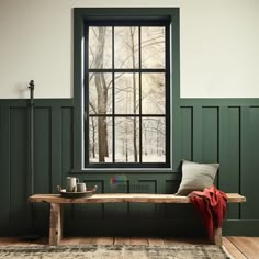 a wooden bench sitting in front of a window