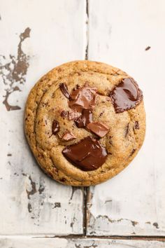 a chocolate chip cookie on a white background