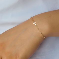 Cute and delicate Cross bracelet, available in sterling, gold, or rose gold.  Will be gift wrapped and ready for gifting.  Length is adjustable. Tiny Cross Bracelet - Mini Cross Bracelet, Confirmation gift for girl, Christmas gifts for her mom sister daughter, Birthday gifts, CR04BS Gold Charm Bracelet Gift, Minimalist Charm Bracelet For Mother's Day, Rose Gold 14k Gold-filled Bracelets As Gift, Rose Gold 14k Gold-filled Bracelet Gift, Personalized Gold Rosary Bracelet As Gift, Mother's Day Gift Rose Gold Charm Bracelet, Personalized Delicate Name Bracelet As A Gift, Delicate Personalized Name Bracelet As A Gift, Adjustable 14k Gold Rosary Bracelet Gift