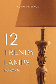 a lamp with the words 12 trendy lamps to own in front of an orange wall