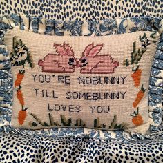 an embroidered pillow with the words you're nobody, i'll be somebody loves you on it