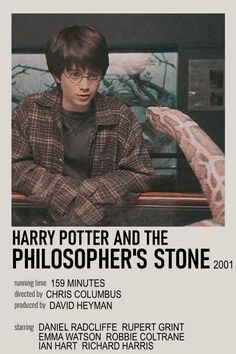 the poster for harry potter and the philosphers stone, with an image of a snake