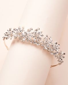 Floral & ethereal, our Natalia Wedding Tiara is fit for royalty. Crafted with crystal flowers & gemstones, this crown will sparkle from all angles on your wedding day. Crystal gemstones & metal flowers; gold version designed with gold crystals Center peak 1.25" Pin loops are located on each end so you can secure in your hair Style #3440 Gold Bridesmaid Jewelry Sets, Gold Bridesmaid Jewelry, Crystal Headpiece Wedding, Bride Hair Jewelry, Crystal Bridal Headpiece, Crystal Wedding Tiaras, Crystal Crown Wedding, Wedding Tiaras, Crystal Bridal Tiaras