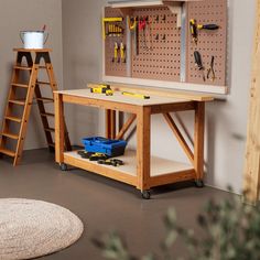 a workbench with tools on it in a room