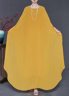 Elegant Yellow Oversized Chiffon Party Dress Batwing SleeveFabric: ChiffonSize & Fit: Fit: This garment fits true to size.Length: Size 3XL measures 52.65"from shoulder to hemBust: Great for any cup size. Waist: Loose Fit. Comfortable room throughout midsection.Hip: Loose Fit - room for hips. Hand Wash Cold. Chiffon Party Dress, Comfortable Room, Batwing Sleeve, Bat Wings, Cup Size, Party Dress, Loose Fitting, Chiffon, Hand Wash