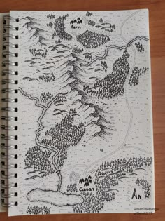 a notebook with a map drawn on it