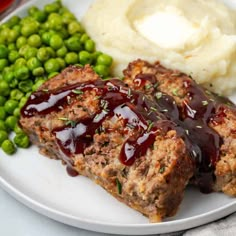 meatloaf, mashed potatoes and peas on a plate