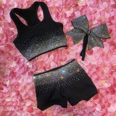 two pieces of black sports bra and shorts with silver sequins