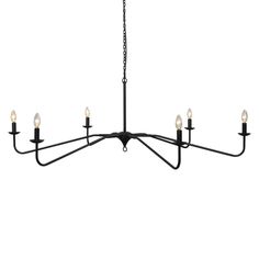 A grand statement piece, this French industrial-inspired, candelabra-style chandelier features slim lines of antique iron and tapered bobeches all around. This piece is compatible with sloped ceilings. French Industrial, Outdoor Table Settings, Antique Iron, Desk And Chair Set, Traditional Chandelier, Lexington Furniture, Elk Lighting, Liberty Furniture, Gold Chandelier