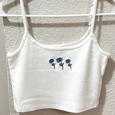 Women’s Hollister Spaghetti Strap Tank Top W/ Small Flower Print. In Very Good Condition And Never Used! White Floral Embroidery Camisole Tank Top, Spring White Tank Top With Floral Embroidery, White Floral Embroidered Camisole Tank Top, White Floral Embroidery Tank Top For Spring, Casual Floral Print Tank Crop Top, White Camisole With Floral Embroidery For Spring, Summer Camisole With Floral Embroidery And Spaghetti Straps, Floral Embroidered Camisole With Spaghetti Straps For Summer, White Fitted Tank Top With Floral Embroidery