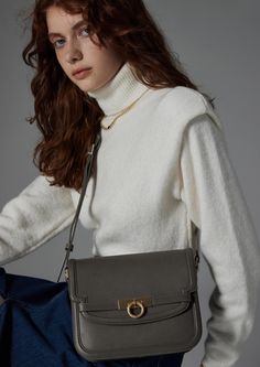 Inspired by Grace Kelly's enduring style, the Grace Medium Flap Bag is a timeless embodiment of classic elegance. This exquisite bag elevates sophistication with its signature lock closure, inspired by a vintage door handle. Crafted with full-grain textured calfskin from USA, this versatile companion strikes a harmonious balance between modern minimalism and timeless charm. Parisa Wang, Purse Closet, What's In My Bag, Grain Texture, Vintage Door, In My Bag, Modern Minimalism, By Grace, Grace Kelly