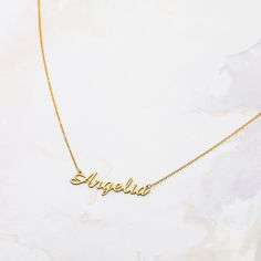 "D E S C R I P T I O N Script Name Necklace * Material: High Quality Solid 925 Sterling Silver * Dimensions: Depending on your font choice, height sizes range from 30 mm to 40 mm lowercase. * Finish: Sterling Silver ∙ 18K Gold ∙ Rose Gold ∙ * All our jewelry is custom made by hand with Love and Care in our workshop * The length option is the TOTAL chain length . If you order an 40 CM plus a 3cm extesnsion\" 1\" extension * All items are nicely packaged ready to gift in elegant jewelry boxes. * I Elegant Adjustable Nameplate Necklaces, Elegant Customized Charm Necklaces For Birthday, Elegant Customizable Charm Necklaces For Birthday Gift, Personalized Elegant Necklaces For Birthday, Personalized Elegant Necklaces For Birthdays, Personalized Elegant Necklace For Birthday, Elegant Charm Necklace As Birthday Gift, Elegant Birthday Charm Necklace, Classic Necklace For Mother's Day