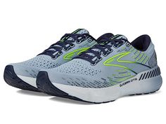 a pair of running shoes on a white background