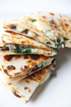 several quesadillas stacked on top of each other